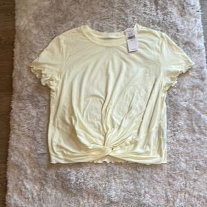 NWT. American Eagle light yellow twist front tee.  Size small.